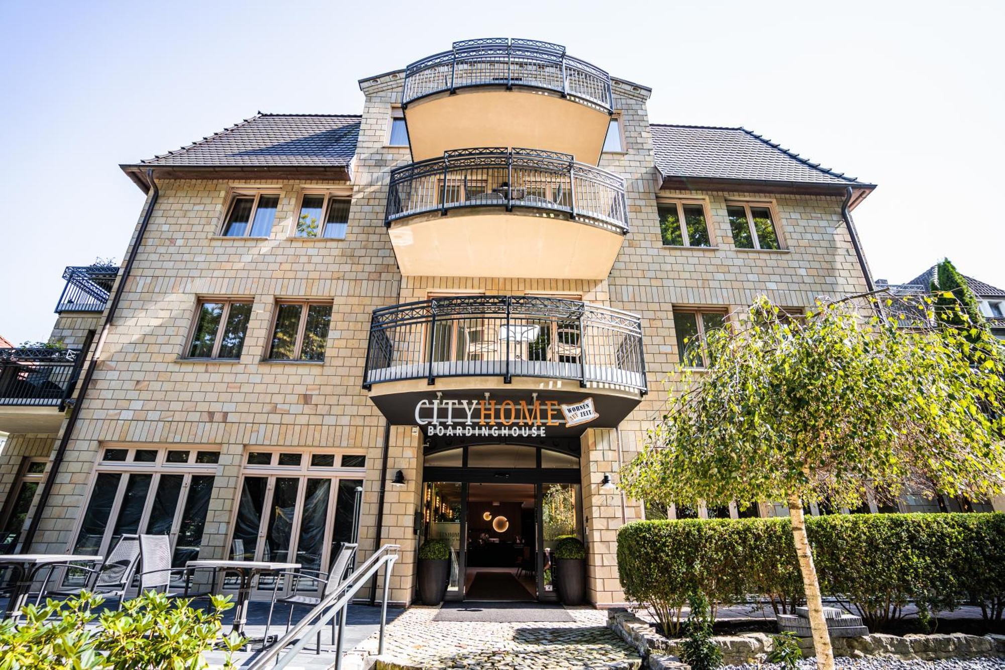 Hotel Cityhome Am Kurpark Бад-Зальцуфлен Экстерьер фото